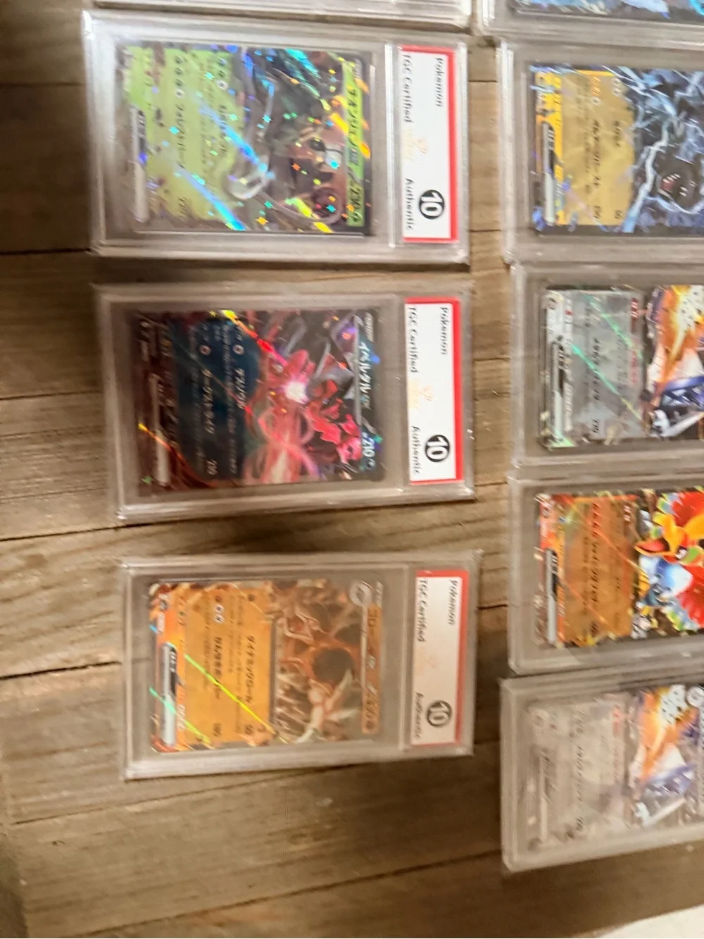 Pokemon Graded Holo Card Lot with Green, Blue, Orange, Black and Yellow Accents